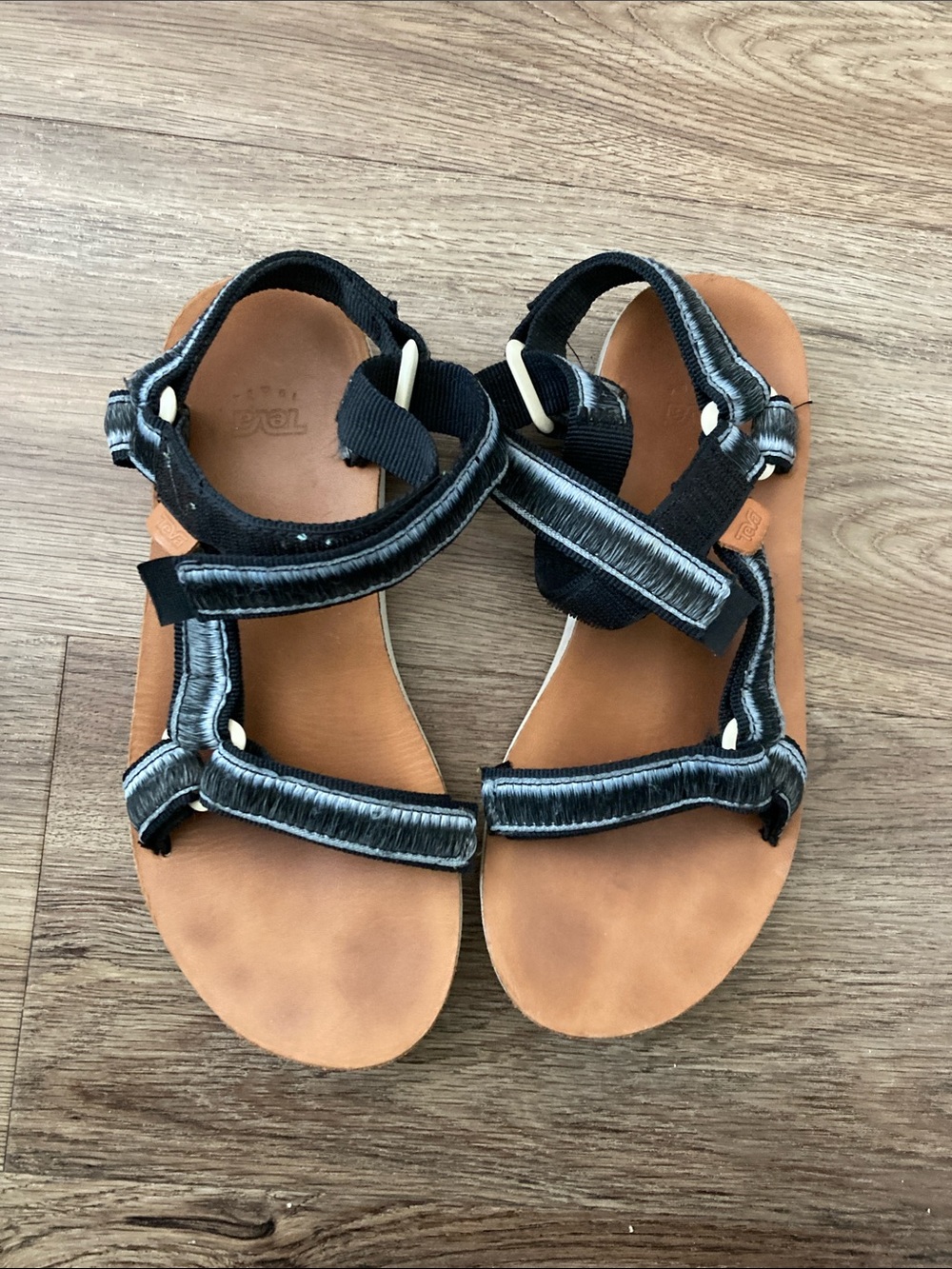 Teva Women's Black and Tan Strappy Sport Sandals